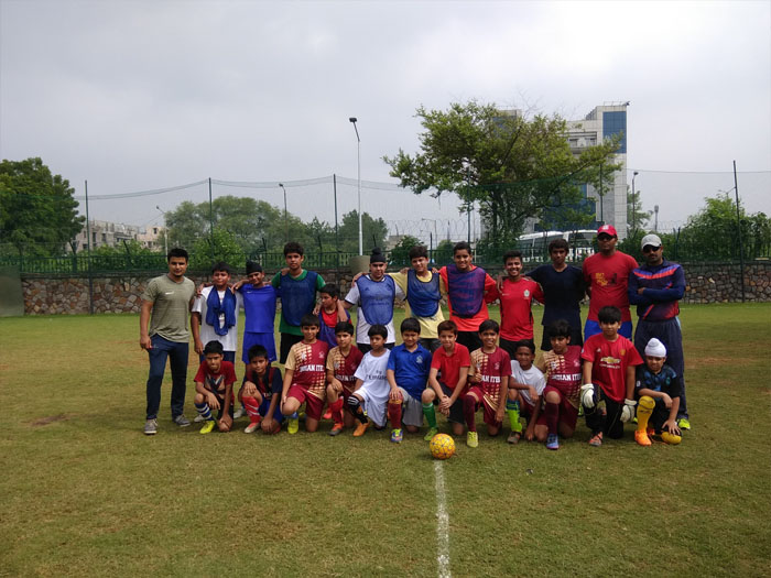 Friendly football match- U-12 and Senior Boys.